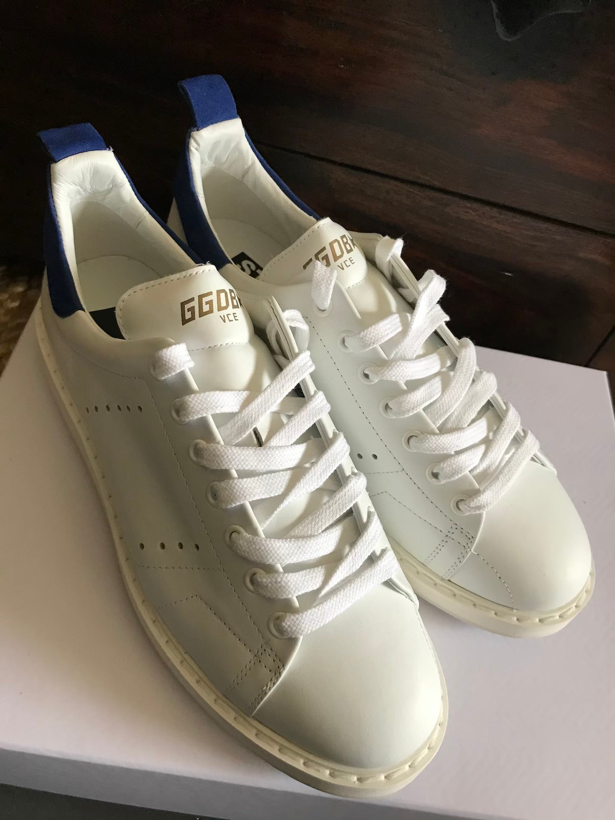 Starter sneakers in leather with navy heel tab